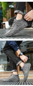Détail de bottines décontractées en cuir gris avec surpiqûres blanches et semelle antidérapante