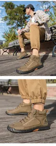 Detailed view of hand-stitched seams and breathable pores on men's khaki PU leather boots