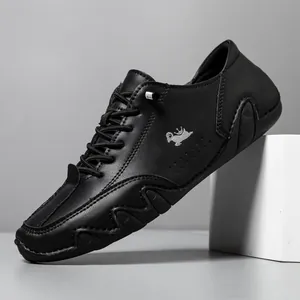Men's black leather casual shoes with lace-up design and silver abstract logo accent