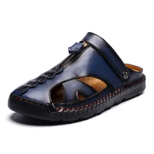 Casual heren muilen van marineblauw leer met ritssluiting en dikke rubberen zool