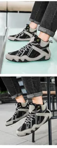 Detailed side view of high-top men's casual boots with wavy rubber sole and lace-up closure