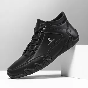 Bottines Martin montantes pour hommes en cuir noir avec logo renard et semelle antidérapante