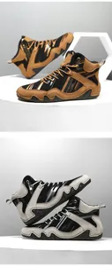 Detailed view of high-top tactical boots featuring wave-pattern side support and rubber sole