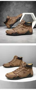 Détail de bottines marron pour hommes en similicuir avec laçage classique et semelle antidérapante