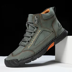 Men's grey high-top outdoor boots with stylish contrast stitching and thick soles