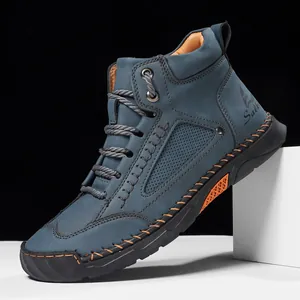 Men's high-top nubuck leather boots in deep blue with orange contrast hand stitching