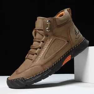 Men's brown leather mid-top casual boots with hand-stitched detail and rubber soles