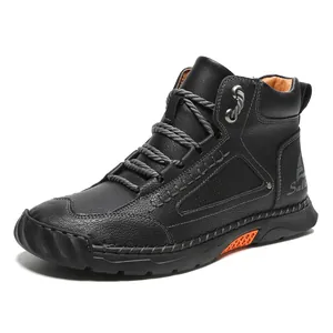Men's black pebble leather ankle boots with durable hand-stitched details and lace-up closure