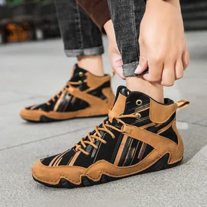 Outdoor shot of men's high-top patchwork Martin boots with durable rubber soles