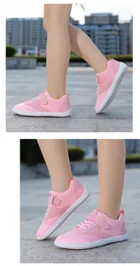 Pink wide-toe barefoot sneakers for kids with mesh fabric and velcro straps detail