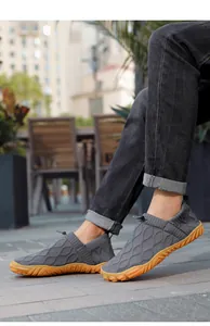 Detailed view of camel outdoor water shoes featuring breathable mesh and non-slip rubber soles