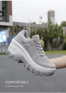 Detail view of breathable grey mesh platform sneakers with heart-shaped sole accents