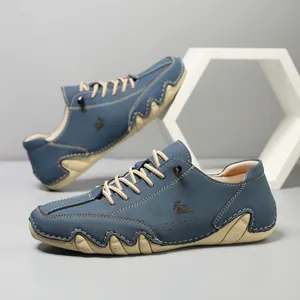 Blue suede casual men's shoes with contrast stitching and unique wavy anti-slip soles