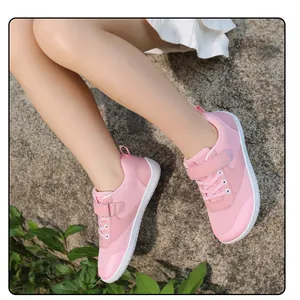 Toddler barefoot sneakers in pink mesh with wide toe box and hook-and-loop closure