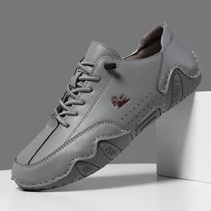 Zapato casual de cuero gris oscuro para hombre con cordones, logo de carnero y suela de goma