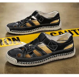 Close-up of black woven leather sandals with contrast white sole and side buckle detail