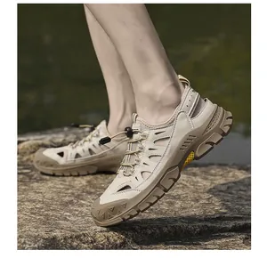 Detail of breathable mesh hollow design and fast lacing system on khaki outdoor sandals