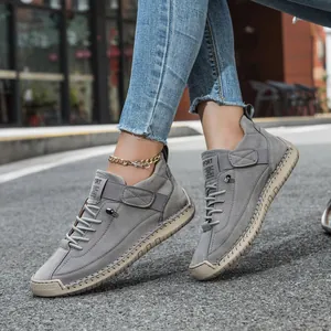 Grey suede casual shoes for women featuring handmade stitching and soft rubber soles