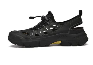 Detail view of breathable hollow mesh and elastic drawstring system on black sandals