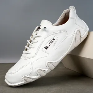 Scarpe casual da uomo in pelle bianca traspirante con suola morbida e strutturata