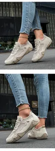 Detail of breathable mesh upper and durable rubber sole on casual beige outdoor sneakers
