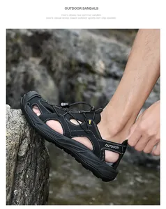 Macro shot of men's hiking sandal featuring reinforced closed toe and elastic bungee laces