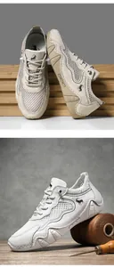 Macro detail of breathable honeycomb mesh and premium leather panels on outdoor sneakers