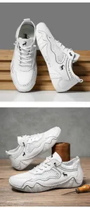 Detail of white breathable mesh sneaker showing hand-stitched craft on a wooden table