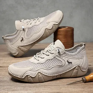 Outdoor breathable mesh shoes for men with beige suede panels and durable rubber soles