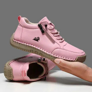 Zapatos casuales de cuero rosa hechos a mano con suela blanda y cremallera lateral