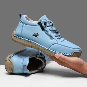 Mocasines de cuero azul claro hechos a mano con cremallera lateral y suela goma