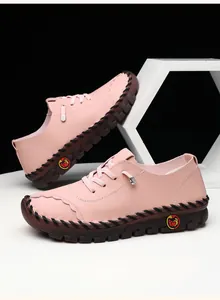 Detail of pink leather loafer featuring lychee texture and anti-slip rubber sole