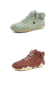 Macro view of high-top suede boots with thick wave soles and adjustable ankle straps