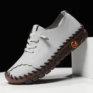 Grey textured leather casual loafer with brown thick sole and decorative hand-stitching
