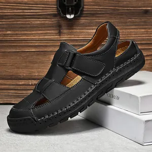 Black genuine leather men's sandals with closed toe design and adjustable velcro straps