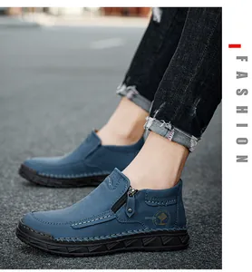 Detailansicht blauer Lederstiefel mit Handnähten und seitlichem Reißverschluss