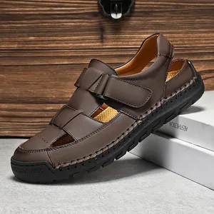 Men's brown leather closed-toe sandals with breathable cutouts and rubber soles