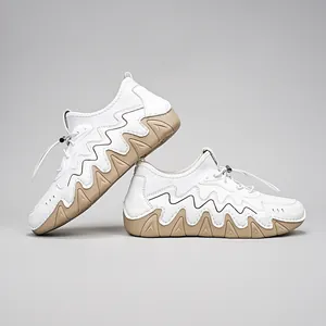 Detail of outdoor sneakers featuring wavy sawtooth thick soles and adjustable toggles