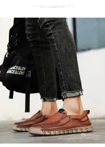 Detailansicht der handgenähten Nähte und rutschfesten Sohle brauner Lederloafers