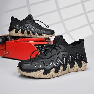 Outdoor sports shoes with black leather mesh upper on a vintage typewriter background
