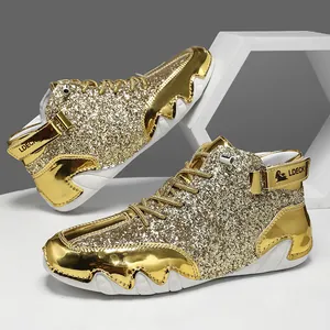 Sneakers alte glitterate color oro con paillettes e cinturino a strappo a specchio
