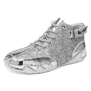 Stivali Martin glitterati argento con finiture in pelle metallizzata e velcro