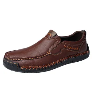 Classic dark brown leather loafers for men with decorative hand-stitched detailing