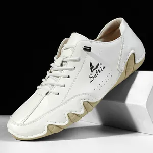 Men's casual leather shoes in white with textured finish and khaki rubber lug sole