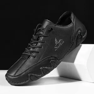 Close-up of black leather casual loafer showing pebble grain texture and Salkin logo