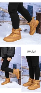 Detailed view of kids winter snow boots in camel yellow with warm plush lining and velcro