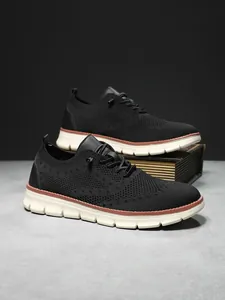 Close-up of breathable knit mesh fabric and detailed textures on men's running sneakers