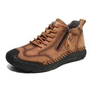Men's brown leather high-top hiking boots with functional side zipper and rubber sole