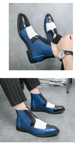 Dettaglio degli stivaletti Derby alti da uomo con un elegante design a blocchi di colore