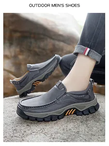 Detail of slip-on outdoor men's leather shoes with non-slip sole on rocky terrain